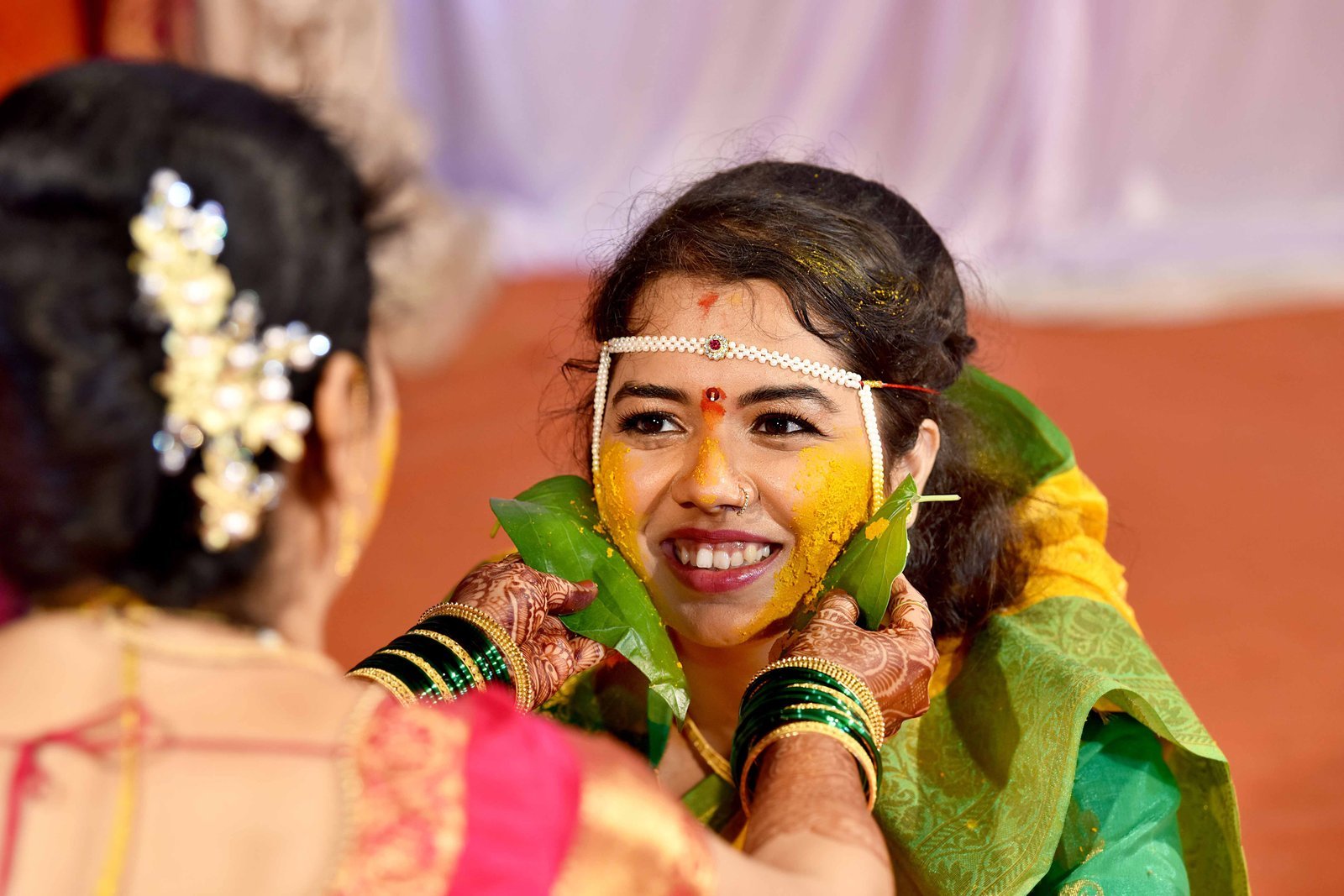 Smiling Maharashtrian bride during her traditional wedding ceremony